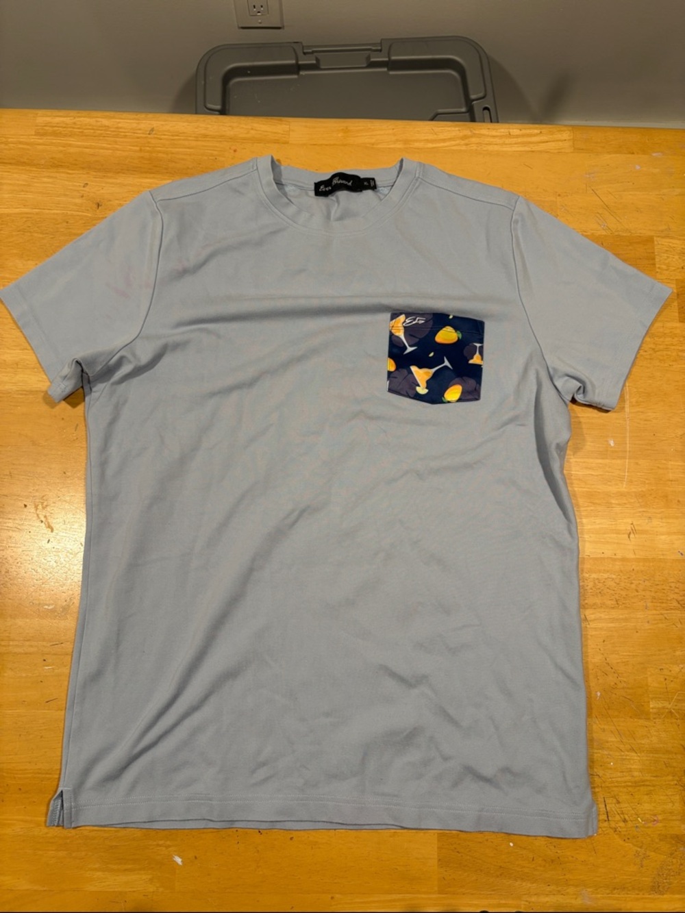 Light Blue Men’s Short-Sleeve Tee with Navy Fruit Pocket